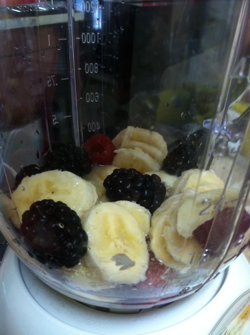 Add a little water and put your fruit in a blender.