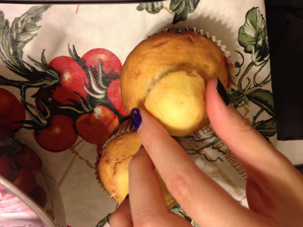 Add a piece of cake to keep the shape of the cupcake for icing.