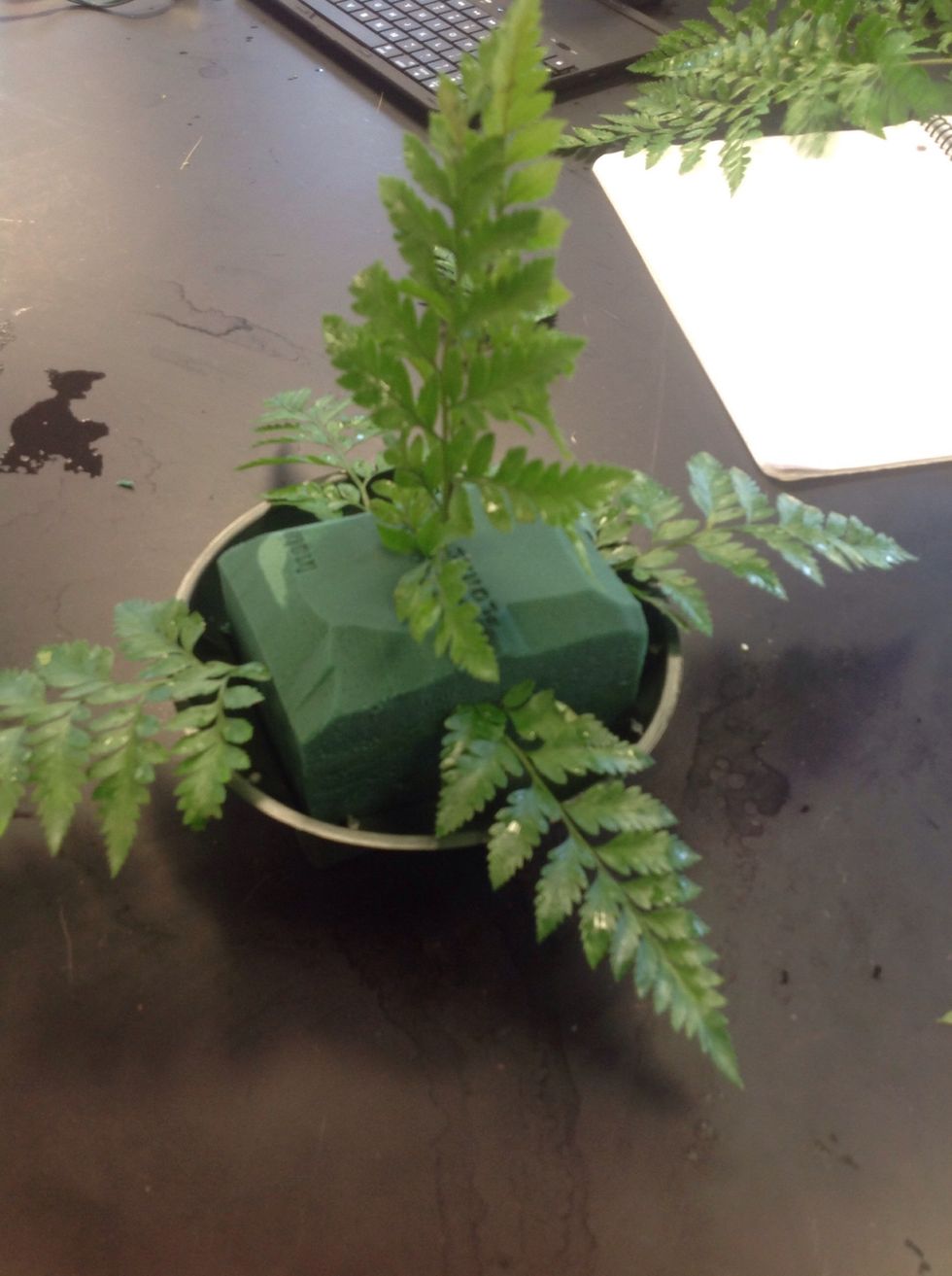 Add a piece of leather leaf in the center and each side of the oasis