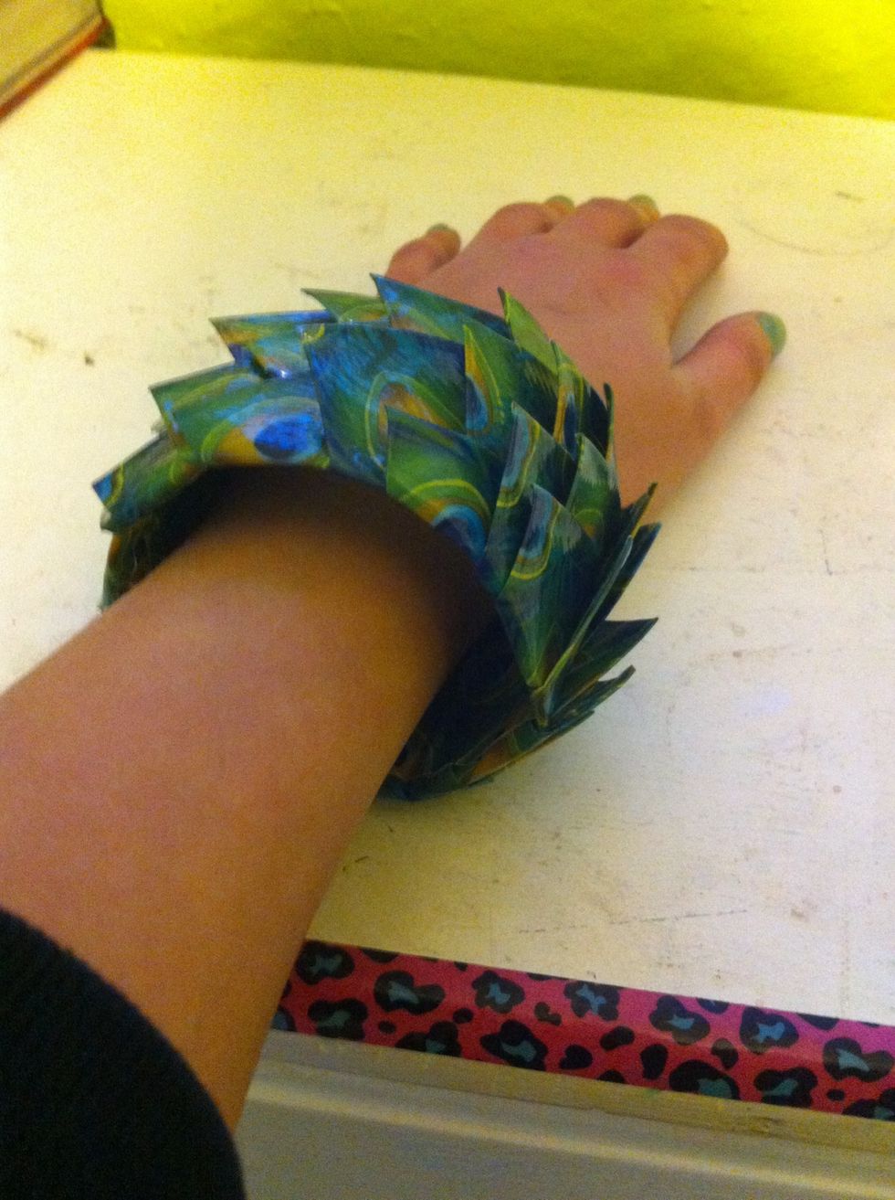 Add a piece of tape to connect the ends and wala!!