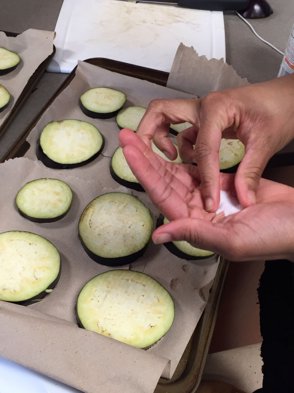 Add a pinch of kosher salt on every eggplant