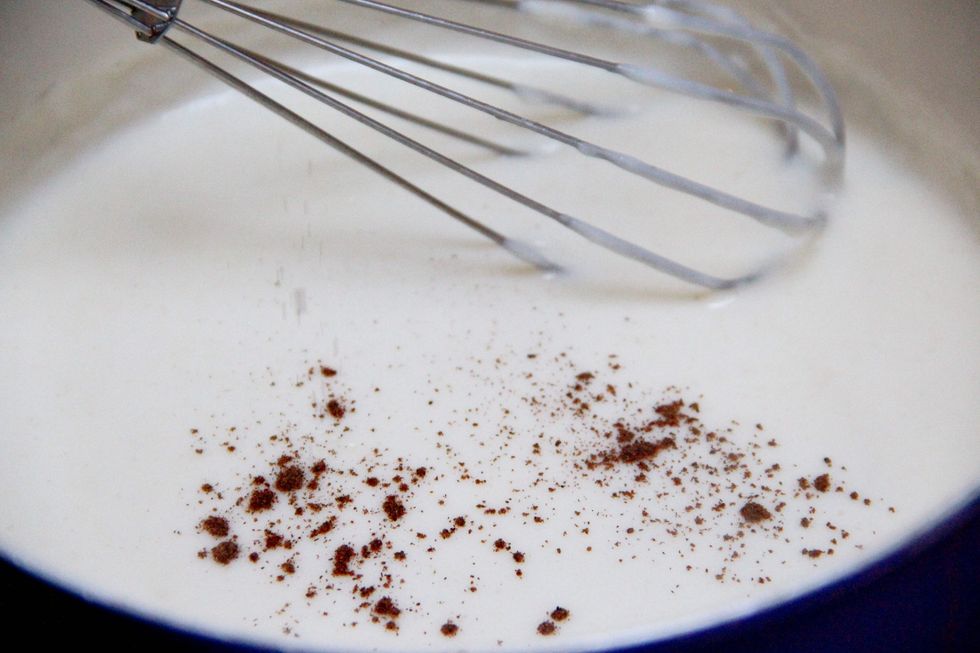 Add a pinch of nut meg and stir and keep stirring until you reach a firm consistency.