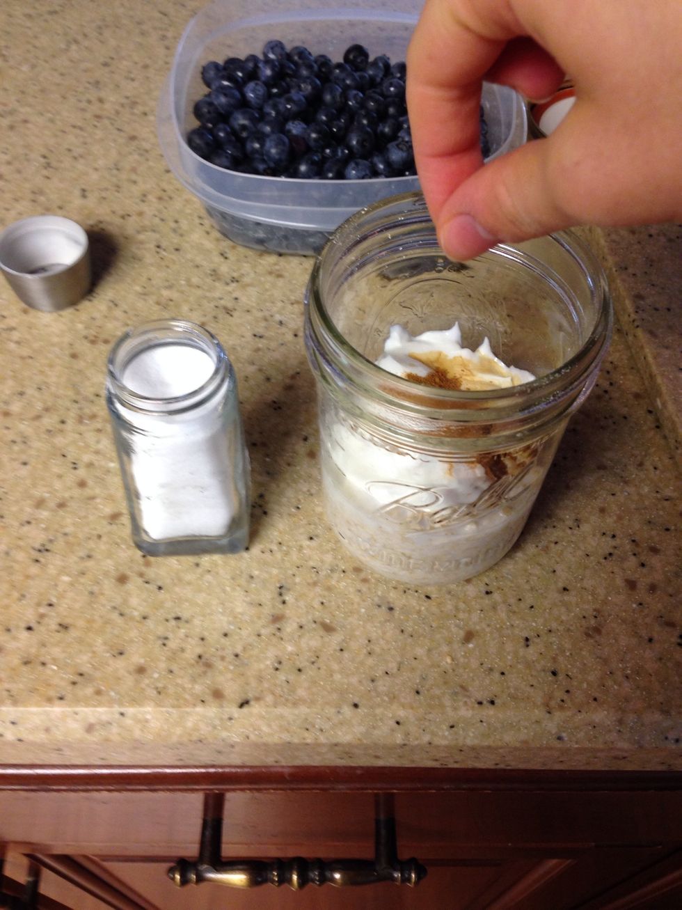 Add a pinch of salt to mason jar.