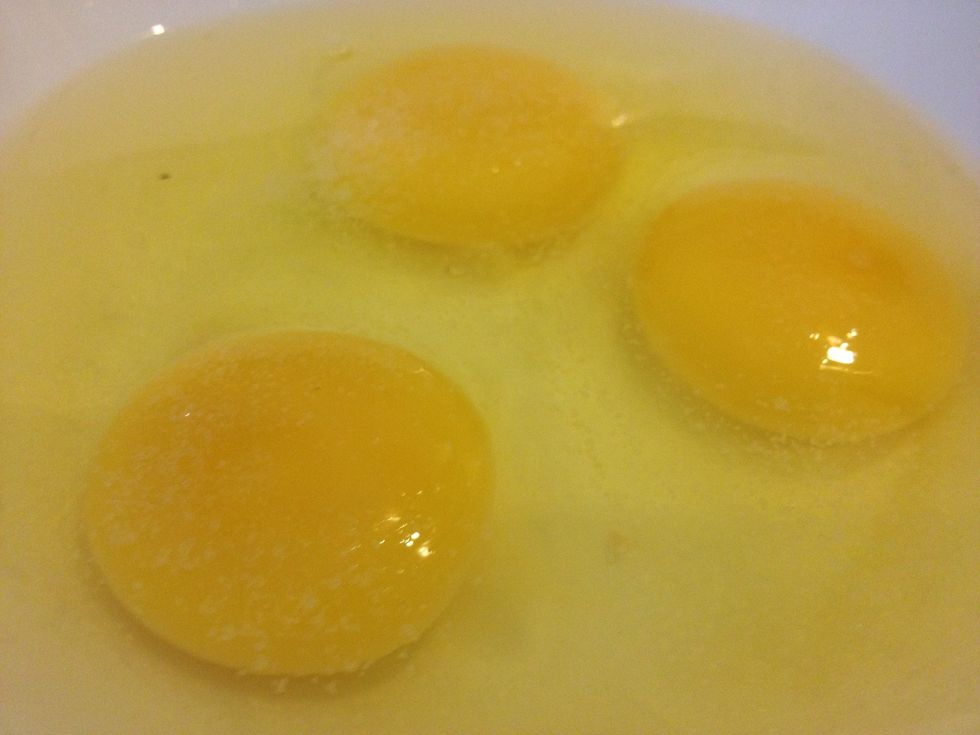 Add a pinch of salt to the eggs and whisk them smooth