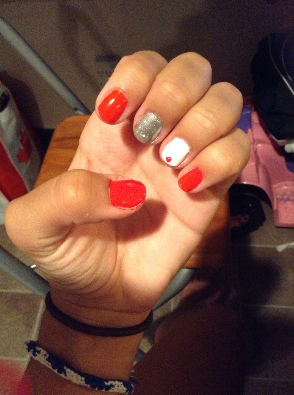 Add a red dot to the tip of your ring finger.