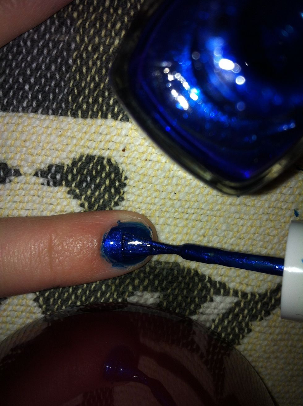 Add a second layer of blue nail polish