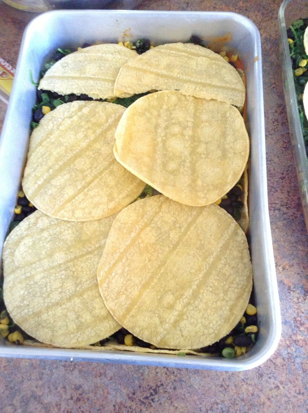 Add a second layer of corn tortillas