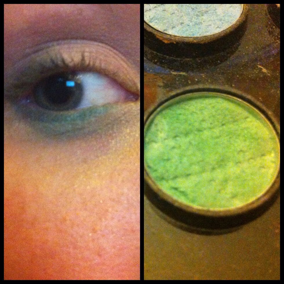 add a shimmering shadow slightly lighter than the liner-I picked a mint green-on the inner half of your lower lash line for further dimension and pop.