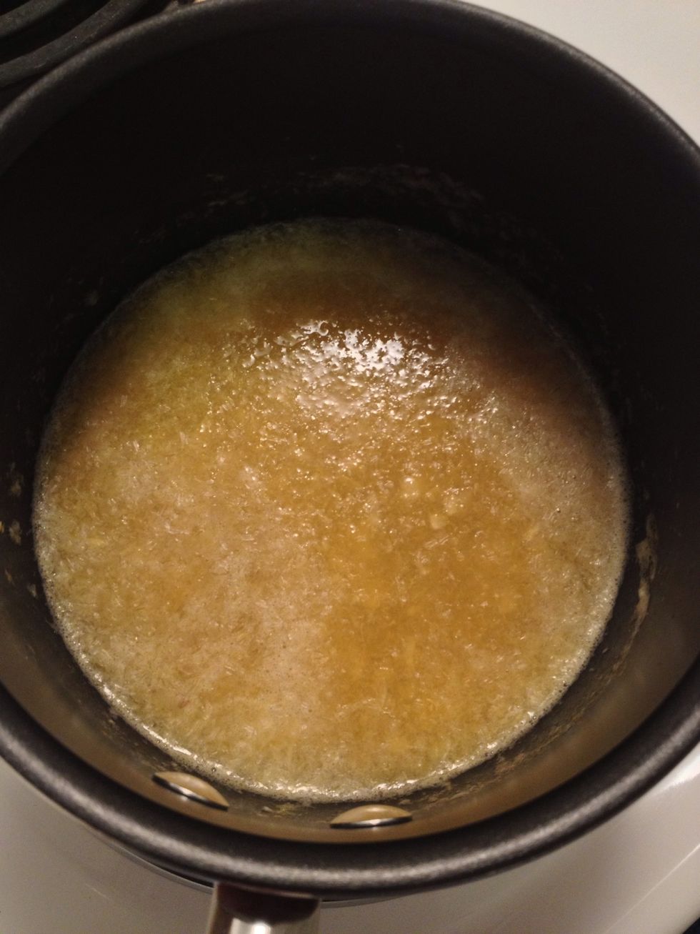 Add a shot of whiskey and warm on a medium to low heat.