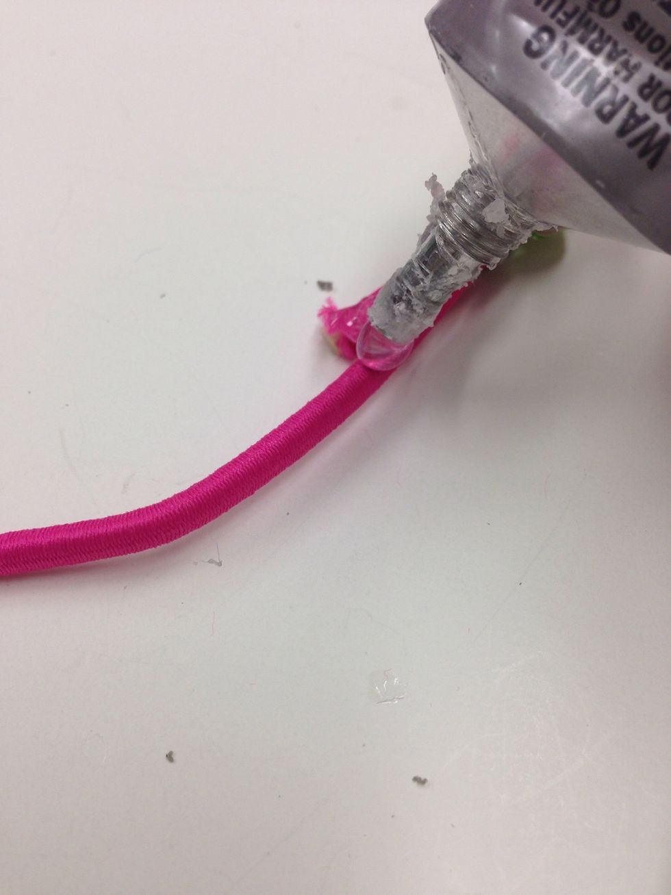 Add a small amount of E6000 as shown.