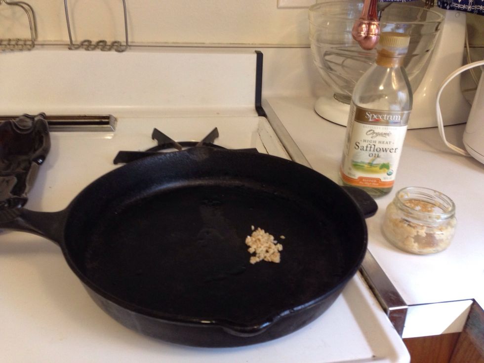 Add a small amount of oil & as much garlic as you want.