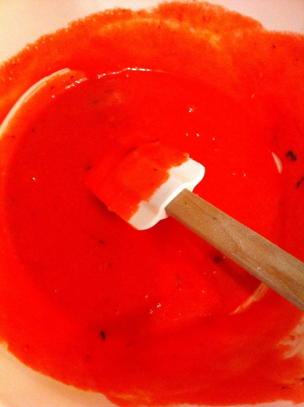 Add a small amount of red gel food colouring until you are satisfied with the colour