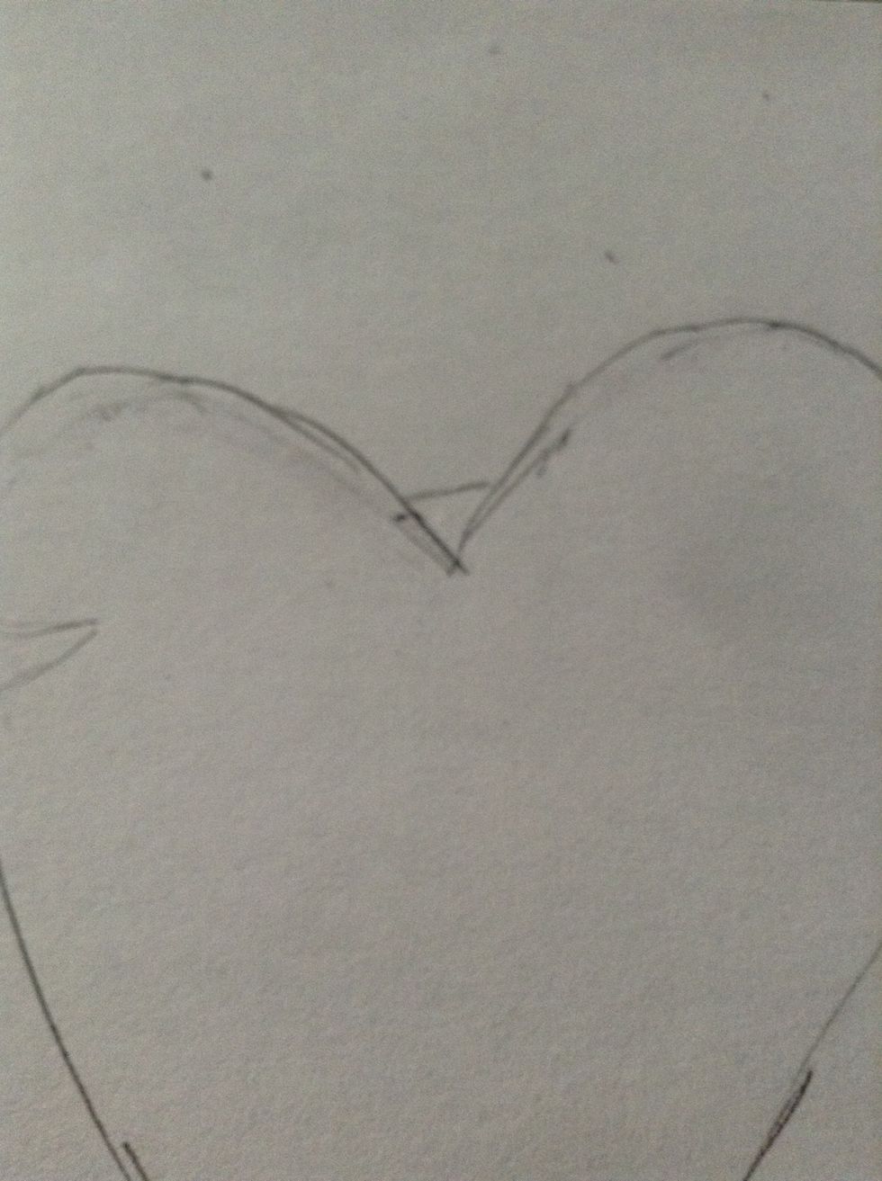 Add a small curve in between the bumps of the heart