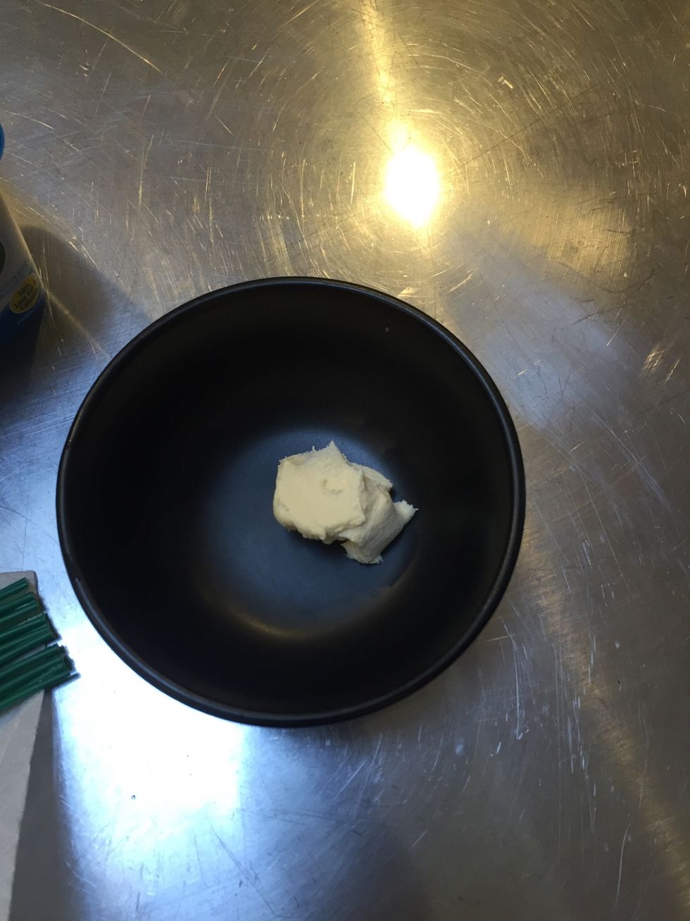Add a small dollop of butter to a bowl and melt. You can skip this step if you don't want butter and just sprinkle the spice in the middle or on the outside of the roll.