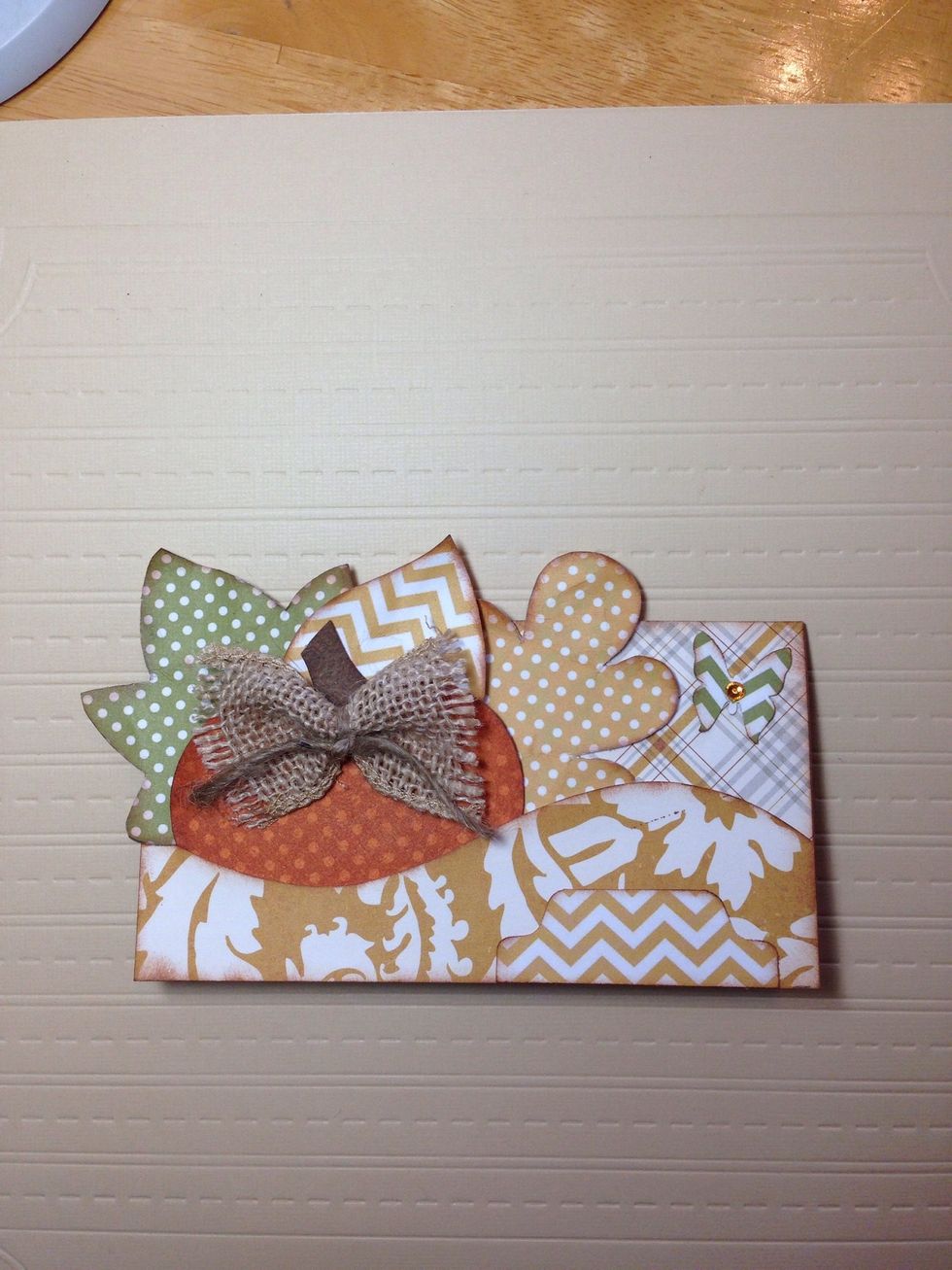 Add a small embellishment, like the little butterfly, to the upper right corner of your card. Write the name of your guest on the tab and set by their place at your table. So lovely!