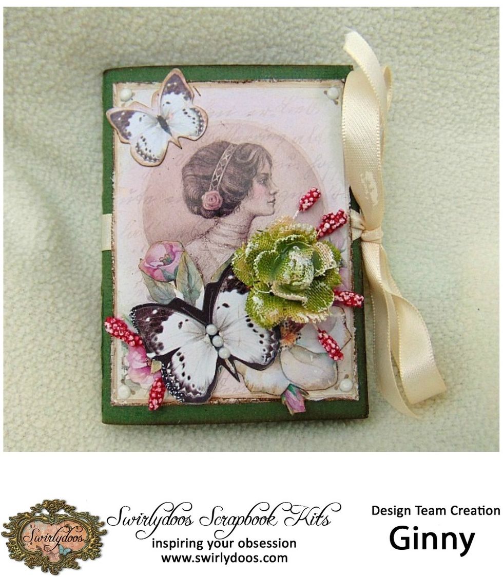 Add a small flower feature and dab with gesso to finish.