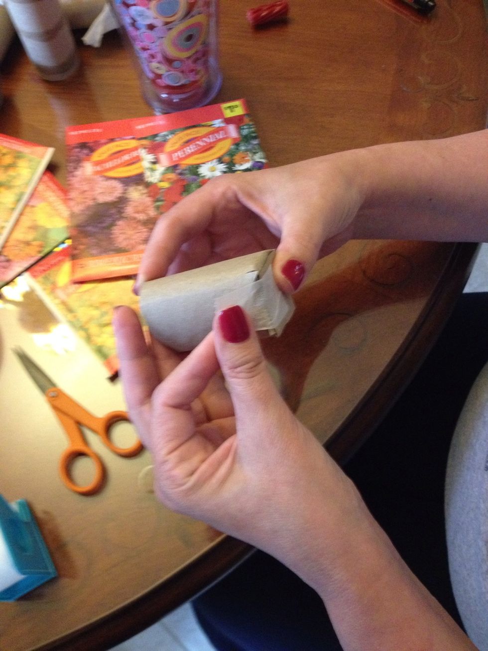 Add a small piece of tape to hold it shut. I used paper tape (better to degrade in the earth). :)