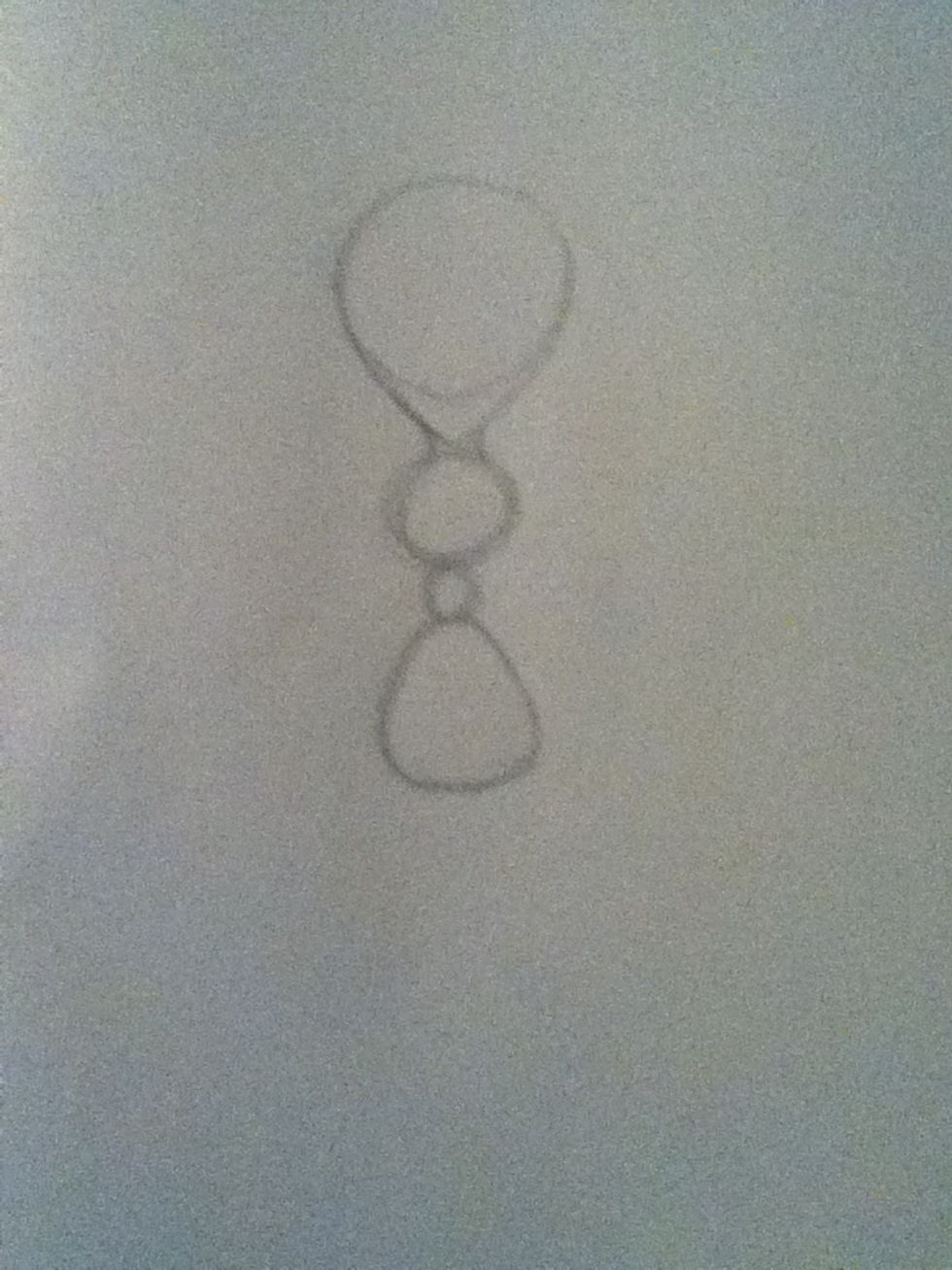 Add a smooth triangle to the bottom, or circle. I made mine too big, as I will later find out.