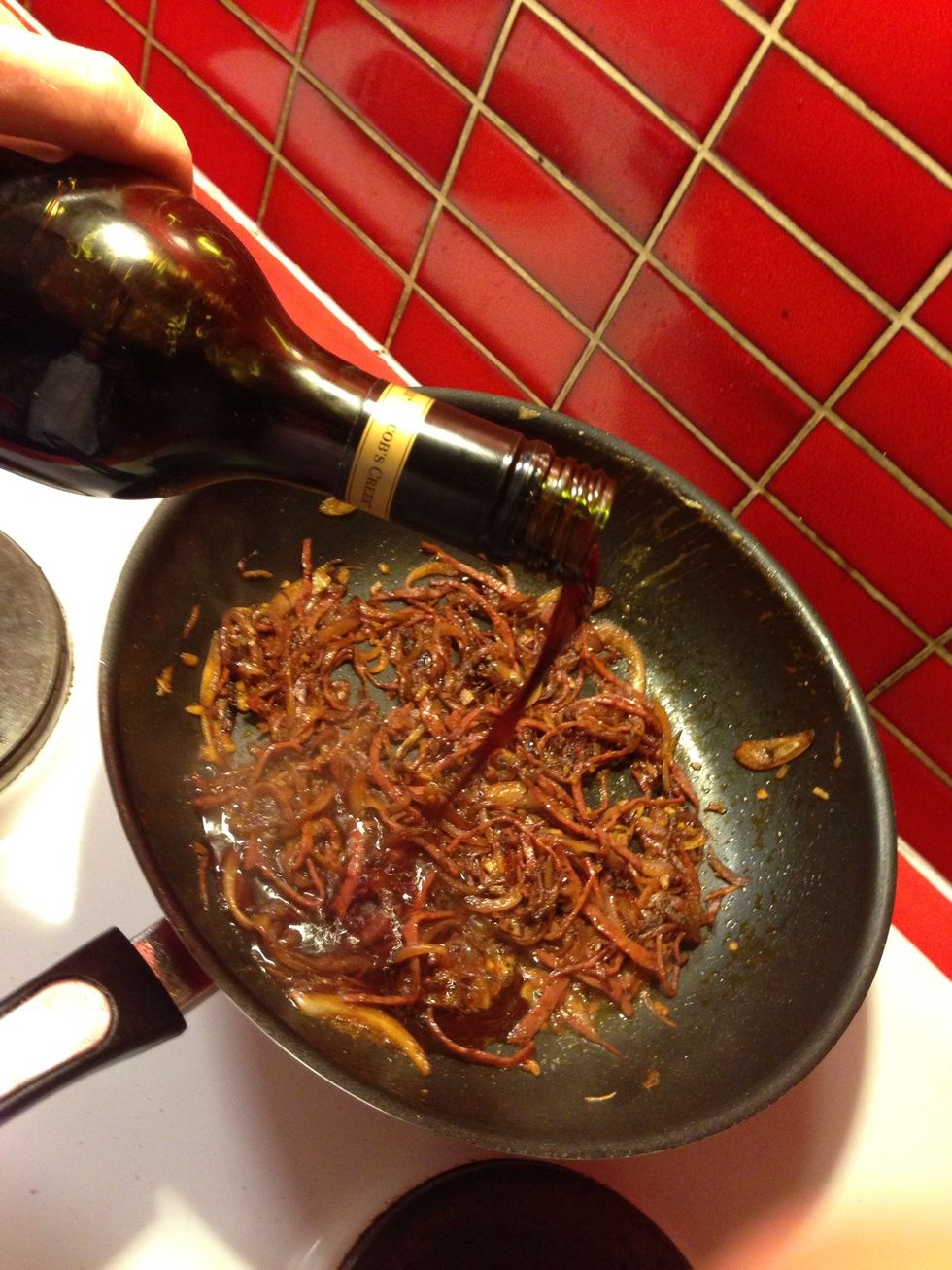 Add a splash of red wine to the hot pan and allow to reduce and cook off the alcohol.