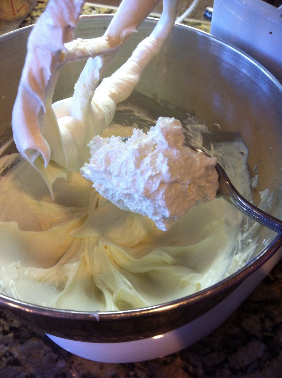 Add a spoonful of marshmallow cream (mine is homemade) and beat this for another min or so. Ready set frost!