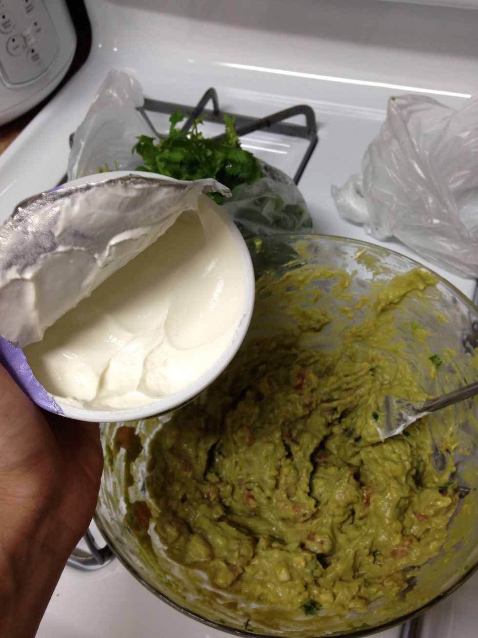 Add a spoonful of sour cream to make your guacamole creamier and to keep it from turning brown the next day!