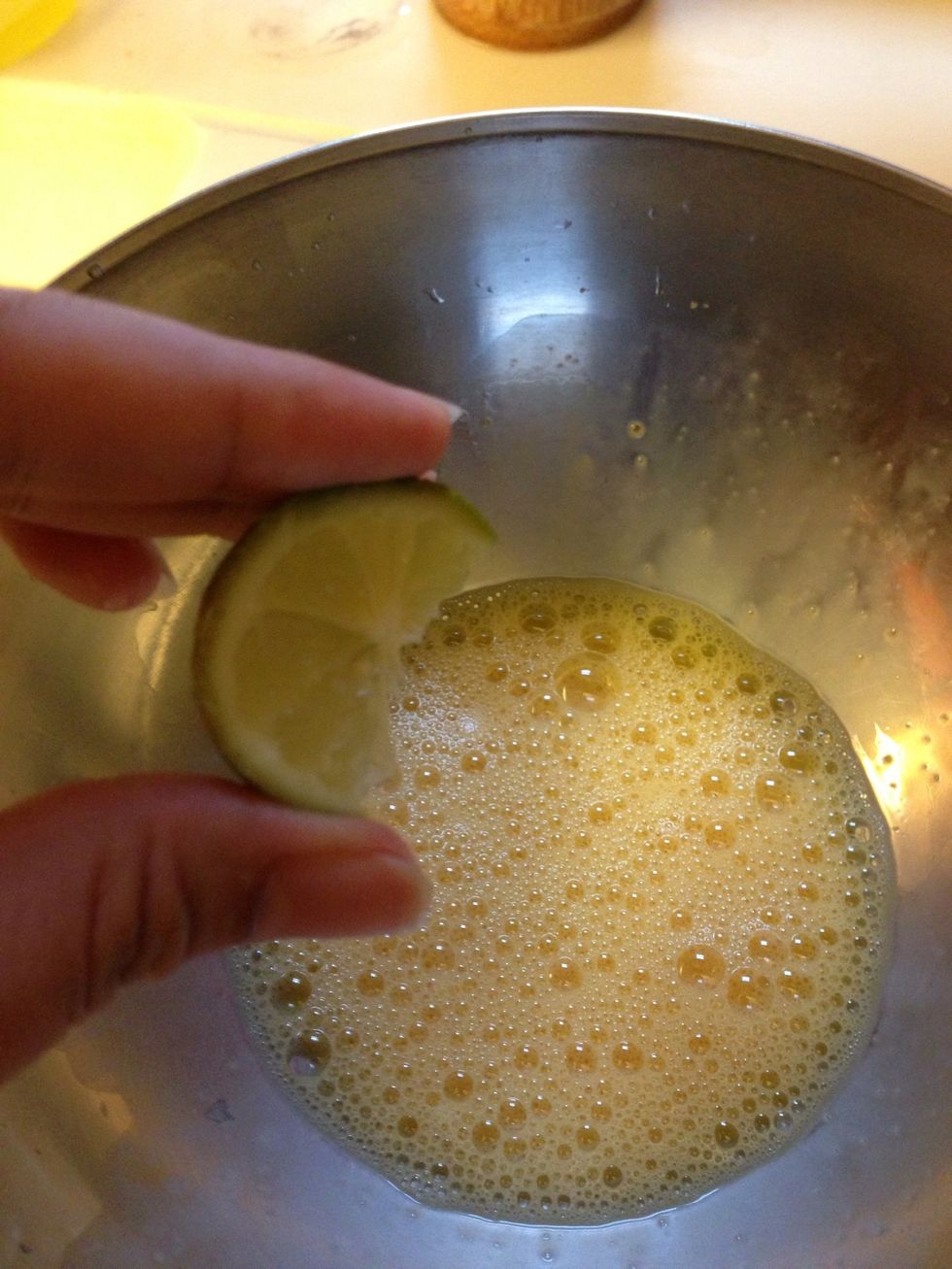 Add a squeeze of lime. This will help the egg hold its fluffiness. Add some salt to taste. Continue to beat the egg till all then bubbly (no running egg)