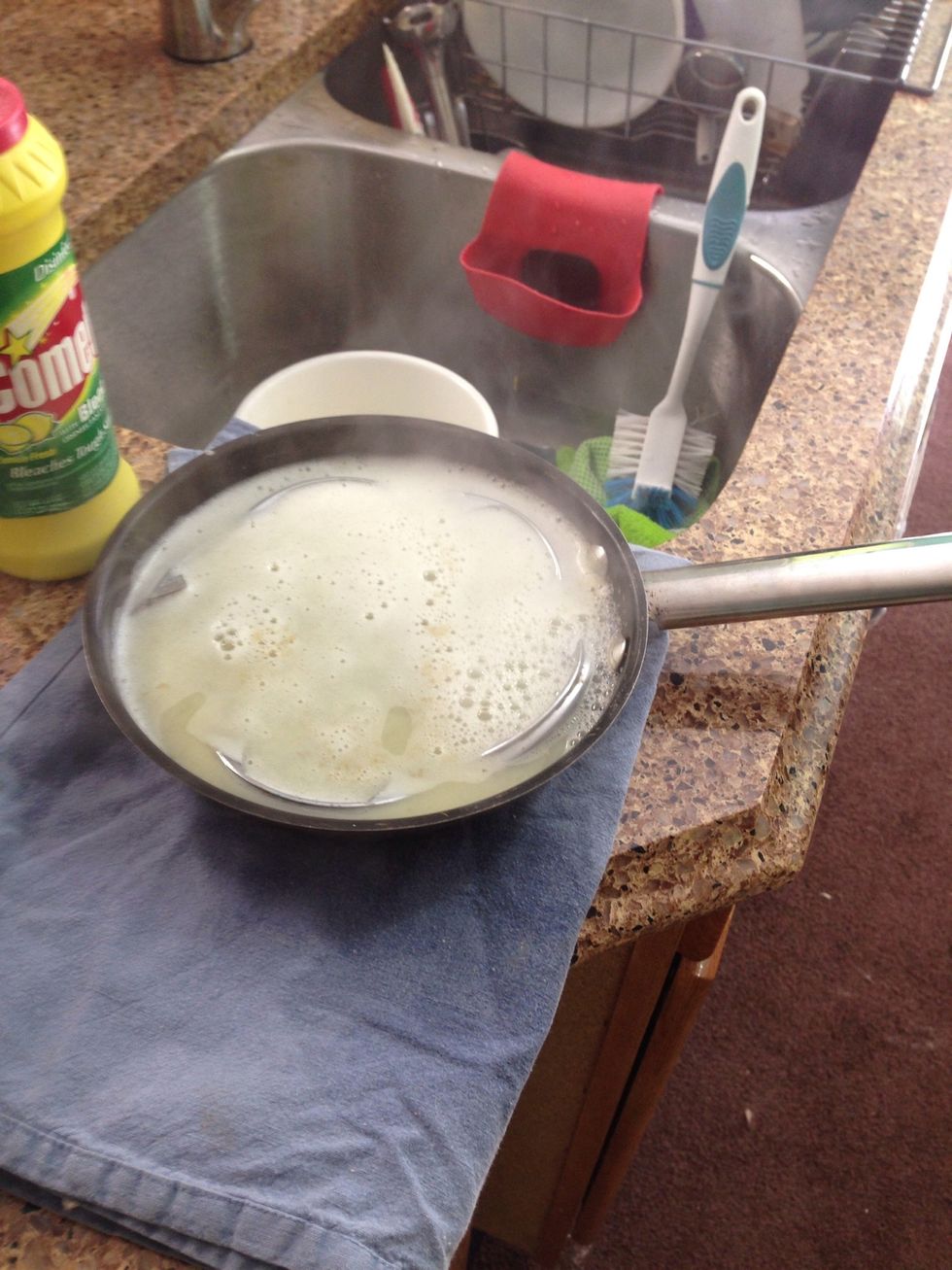 Add a tablespoon of "Comet" or baking soda into the boiling pot of your yummy 50 year old greasy grime. Be careful, it really foams up!