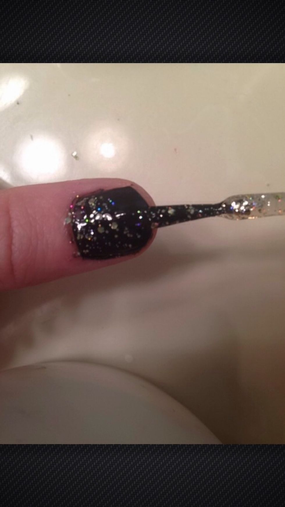 Add a thin layer of gold polish covering entire nail. To get a thin layer brush on edge of bottle on each side to remove excess before painting.