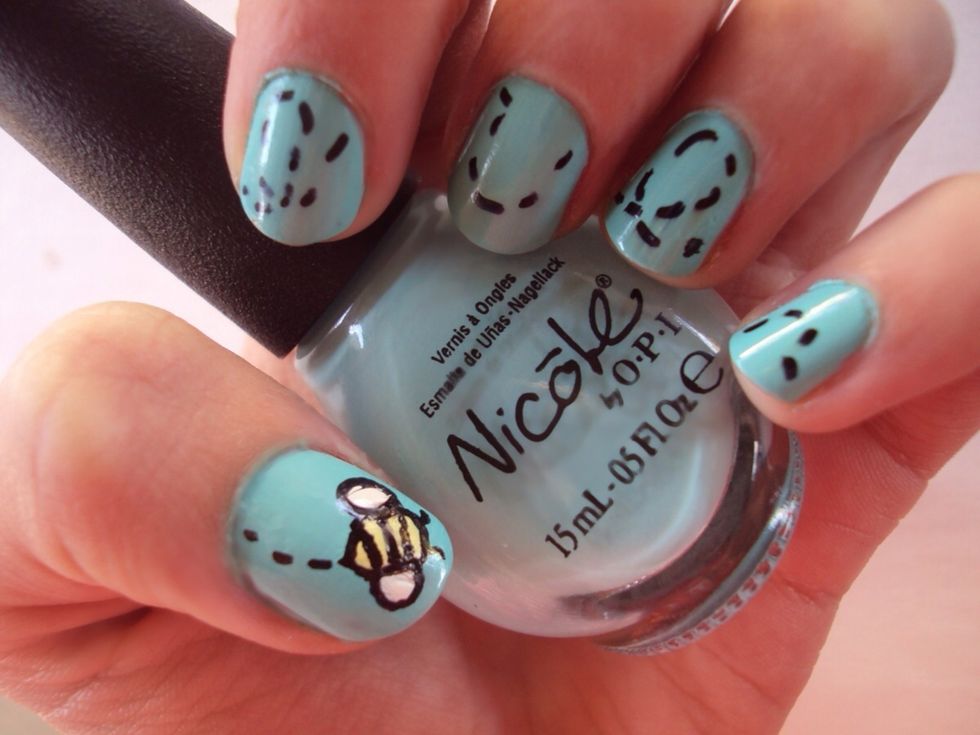 add a top coat and your done! enjoy your little bee nails!