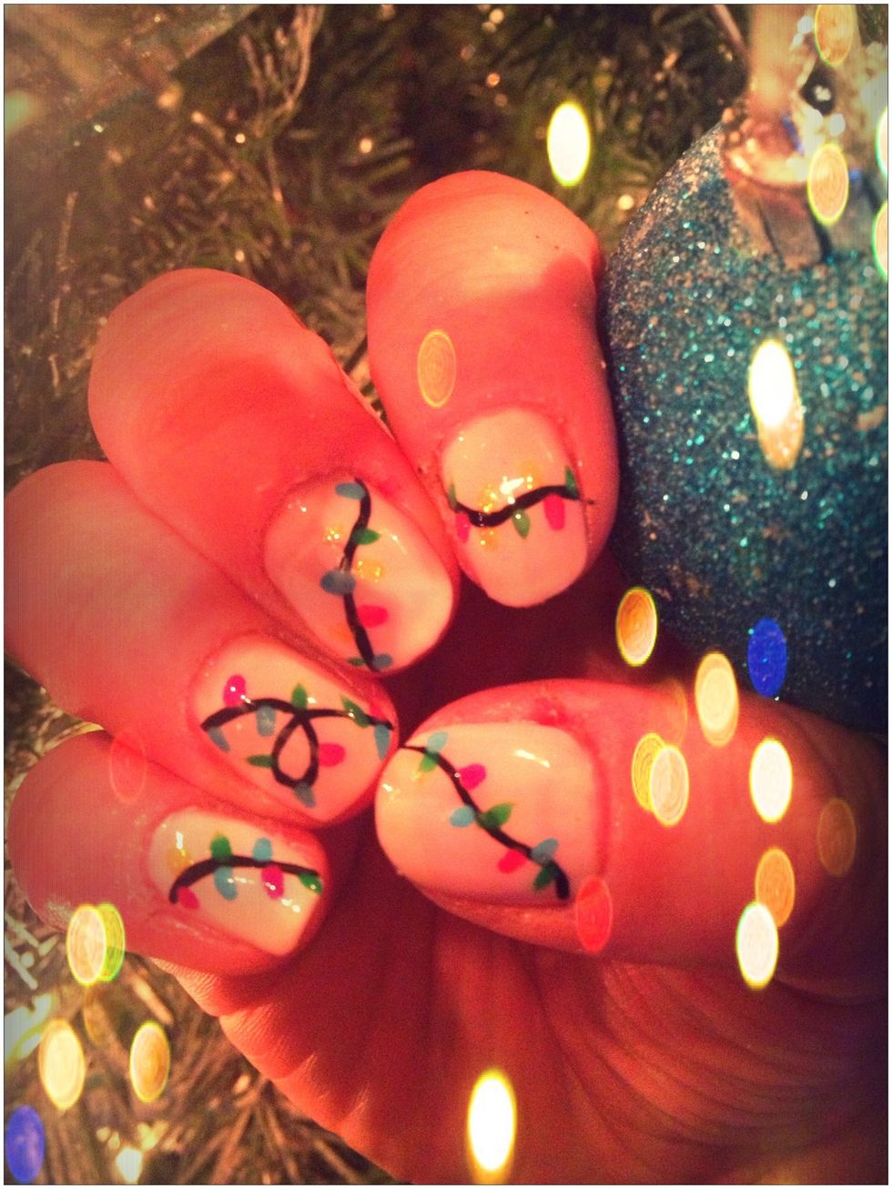 Add a topcoat and there you have a cute festive mani