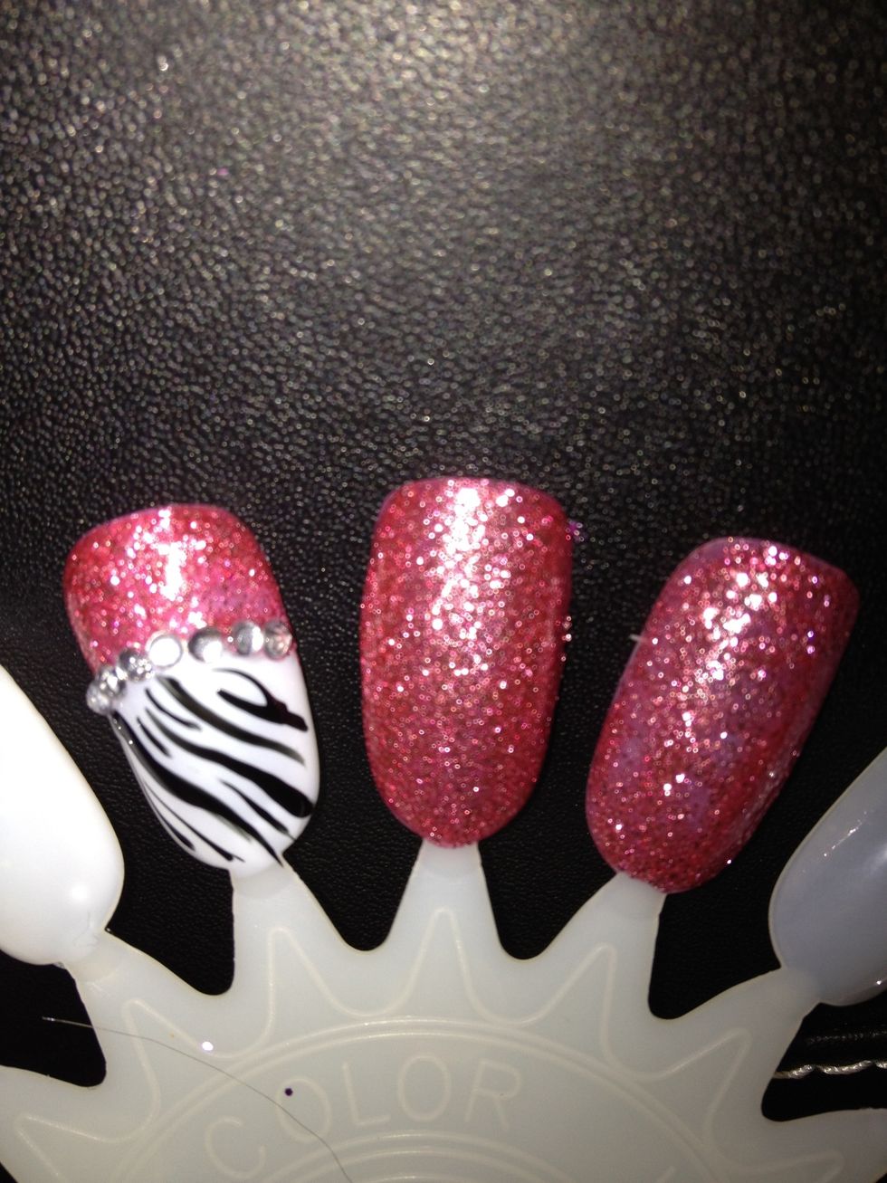 Add a topcoat, you can use this as an accent nail by paint the rest of your nails pink.