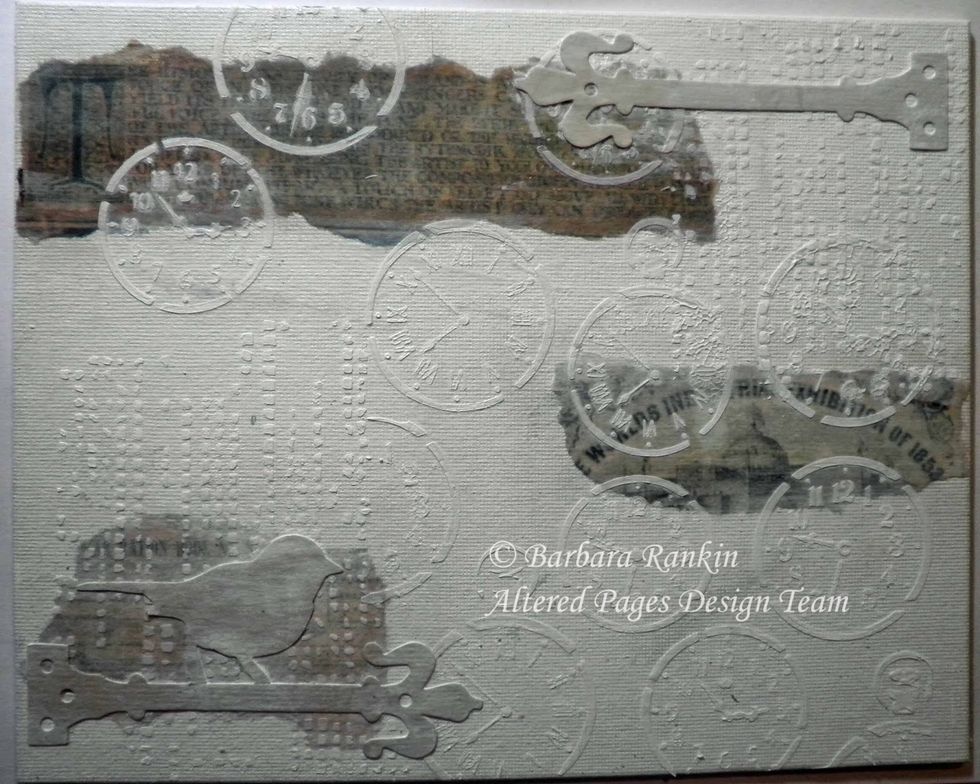 Add a wash of gesso to the entire canvas, use a paper towel or wet wipe to remove some of the paint from the text papers and let dry, or use a heat tool to speed it up.