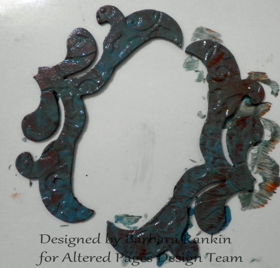 Add a wash of the DecoArt Patina Green, mixed with a tiny bit of retarder, and let set for a minute before wiping off the excess.