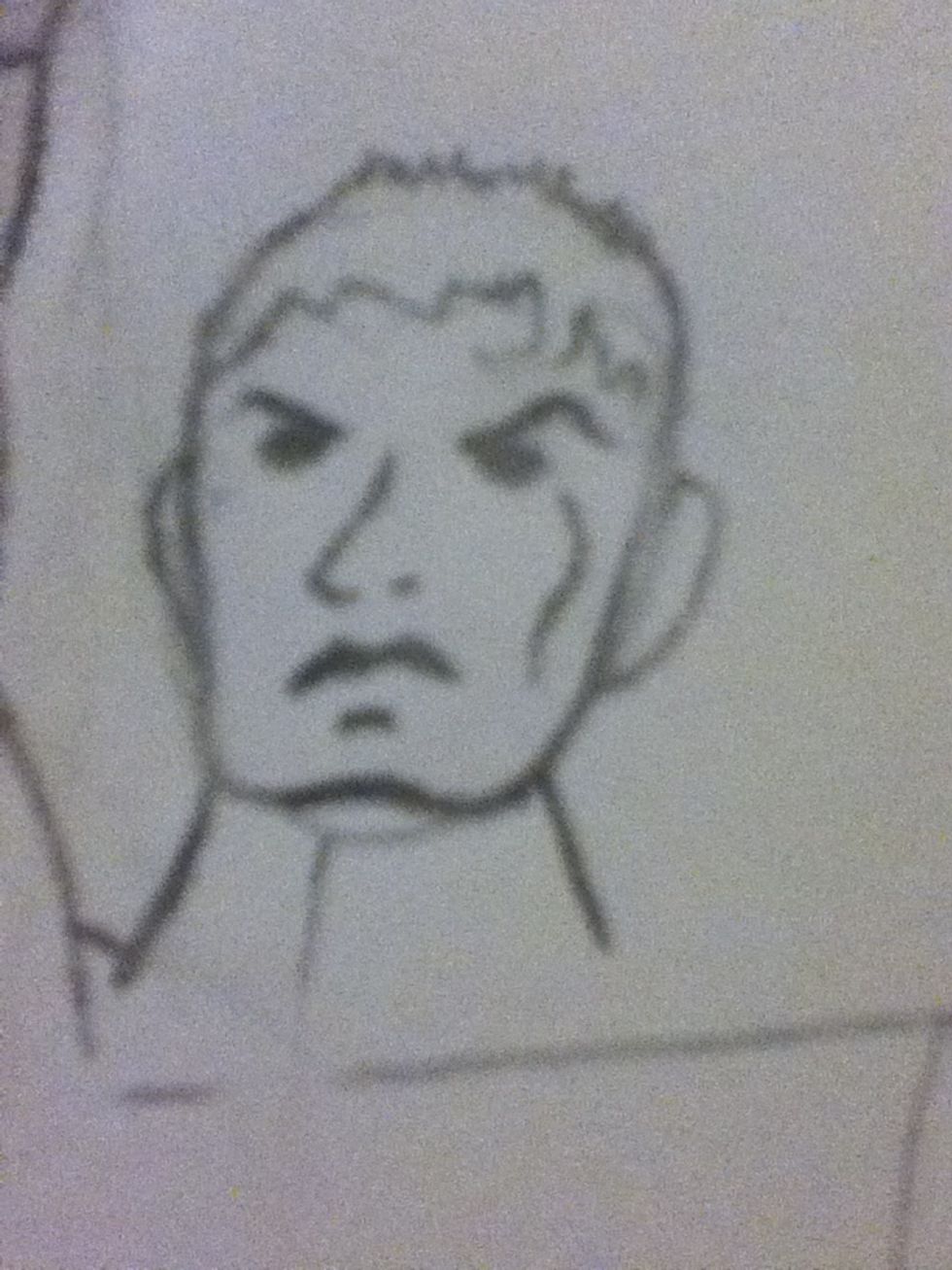 Add a wiggly s for the cheek bone a thick m for the lip and a curvy L for the nose with a dot for a nostril as well as a little line under the lip for his chin