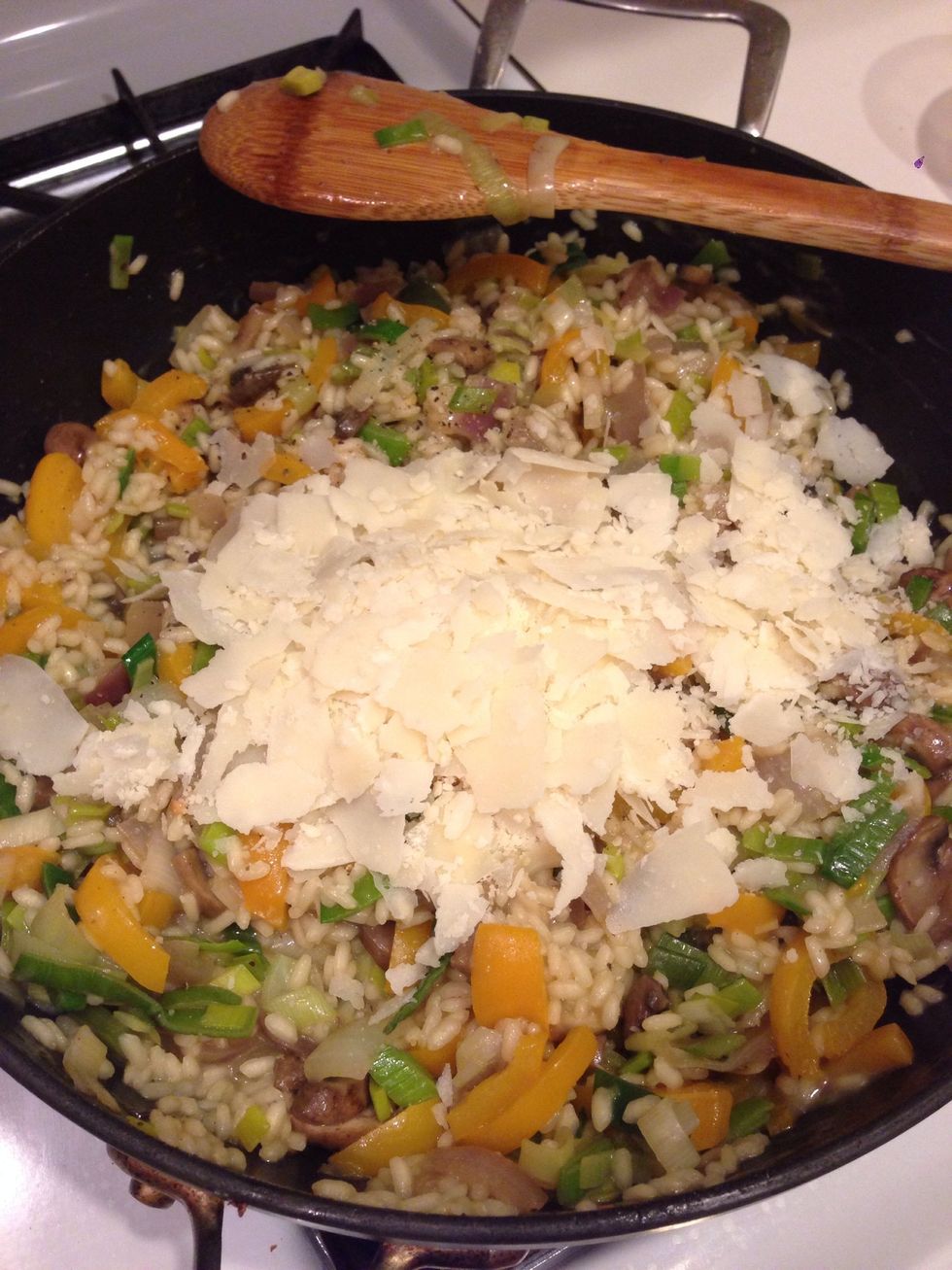 Add about 1/3 cup of Parmesan cheese and stir.