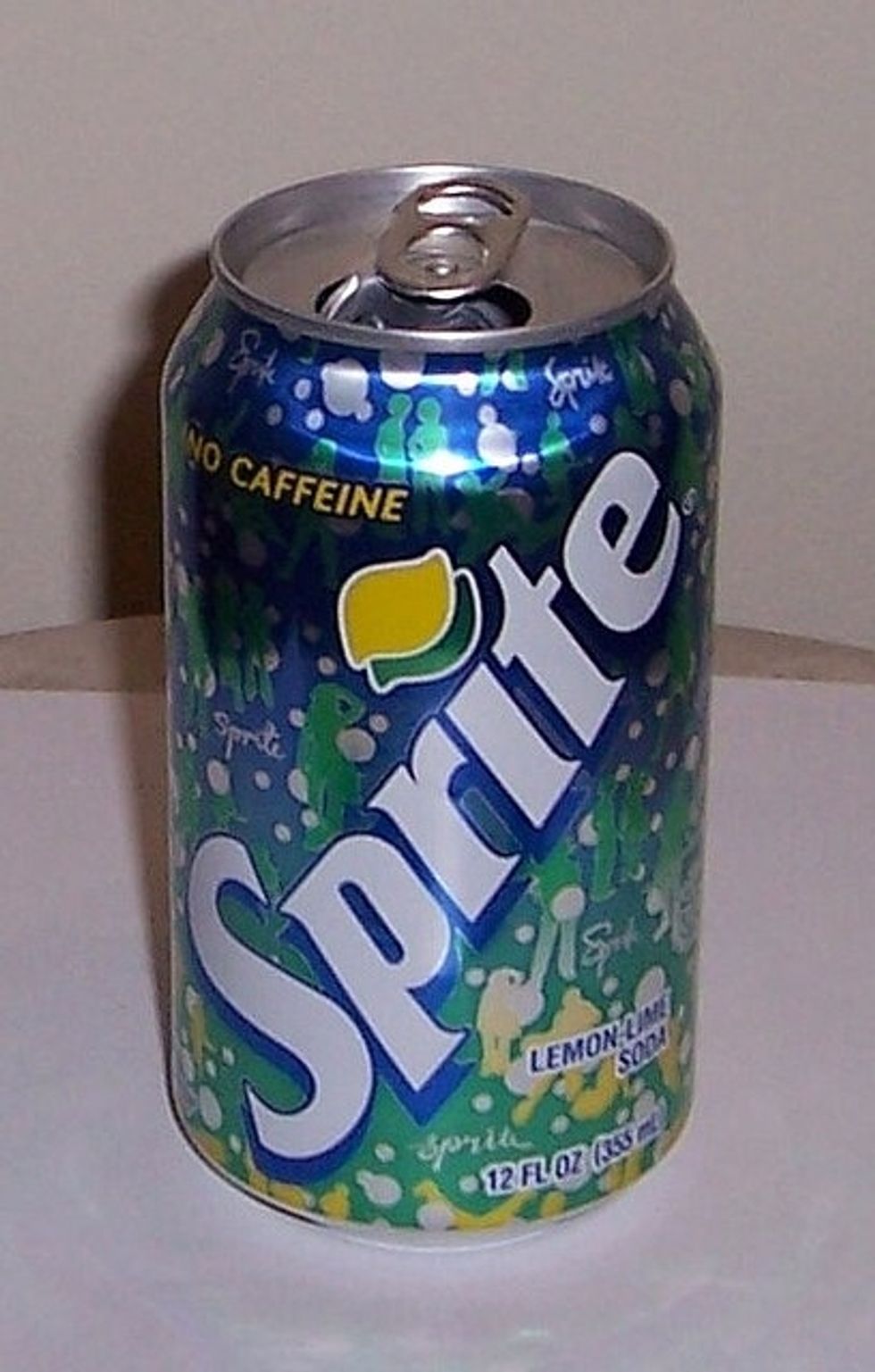 Add about 1 cup of lemon-lime soda or the flower food granule packet that came with the flowers to warm tap water in the vase. Make sure it is mixed well.