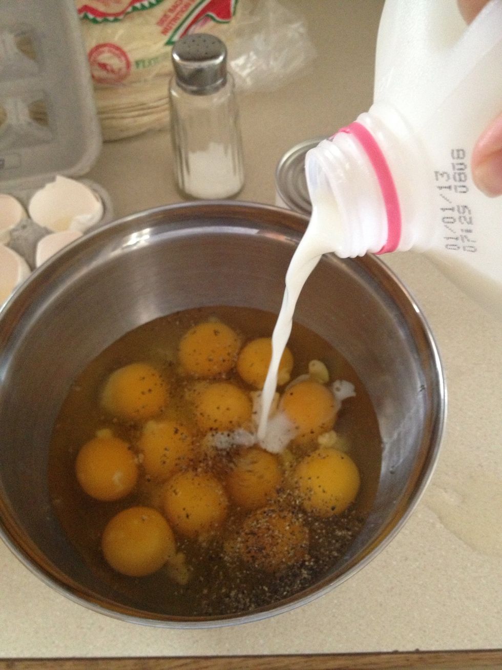 Add about 1 cup of milk. Whisk well.