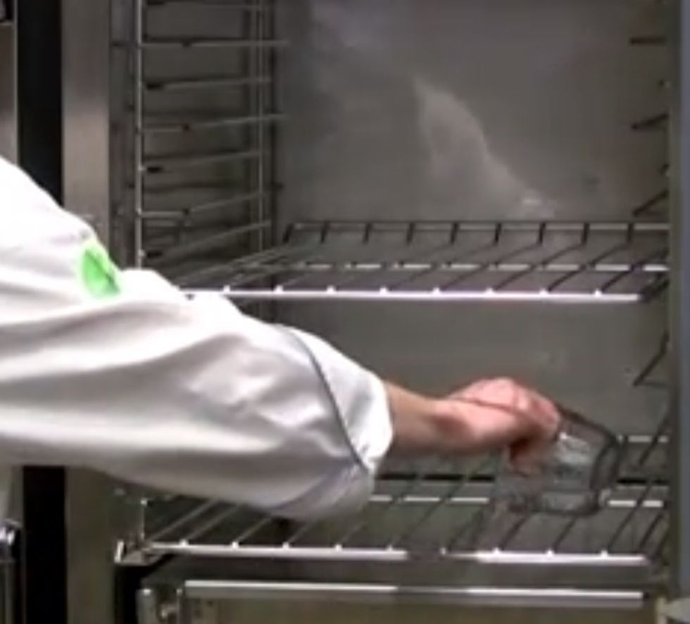 Add about 1 cup of water to the drip tray.