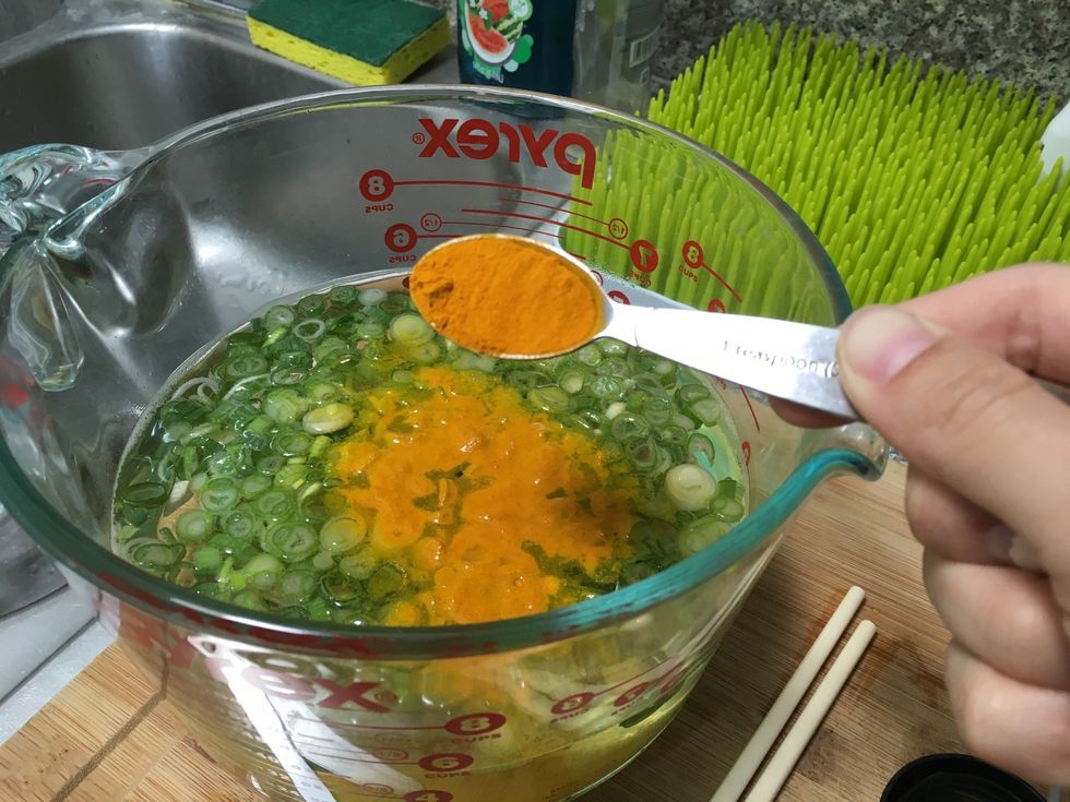Add about 1 tsp of extra turmeric