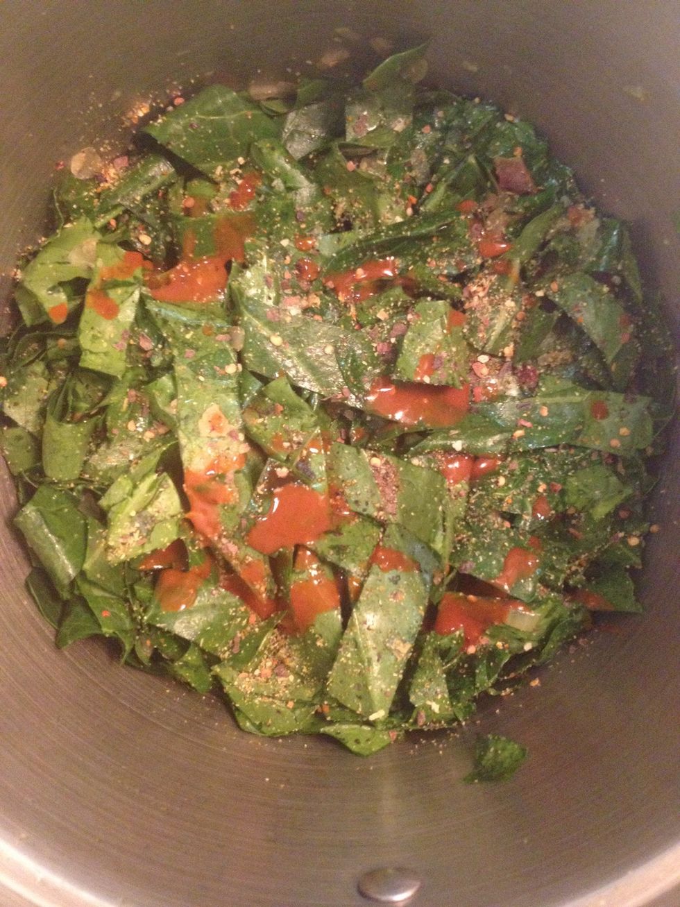 Add about 2 teaspoons of Worcestershire sauce, a sprinkle of red pepper flakes, a sprinkle of Mrs Dash to cover greens, and a few splashes of hot sauce.