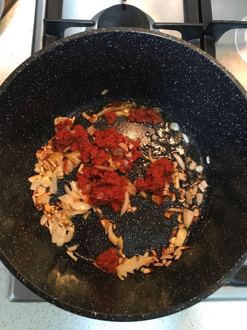 Add about 2 tsp of red curry paste, stirring till it mixture together