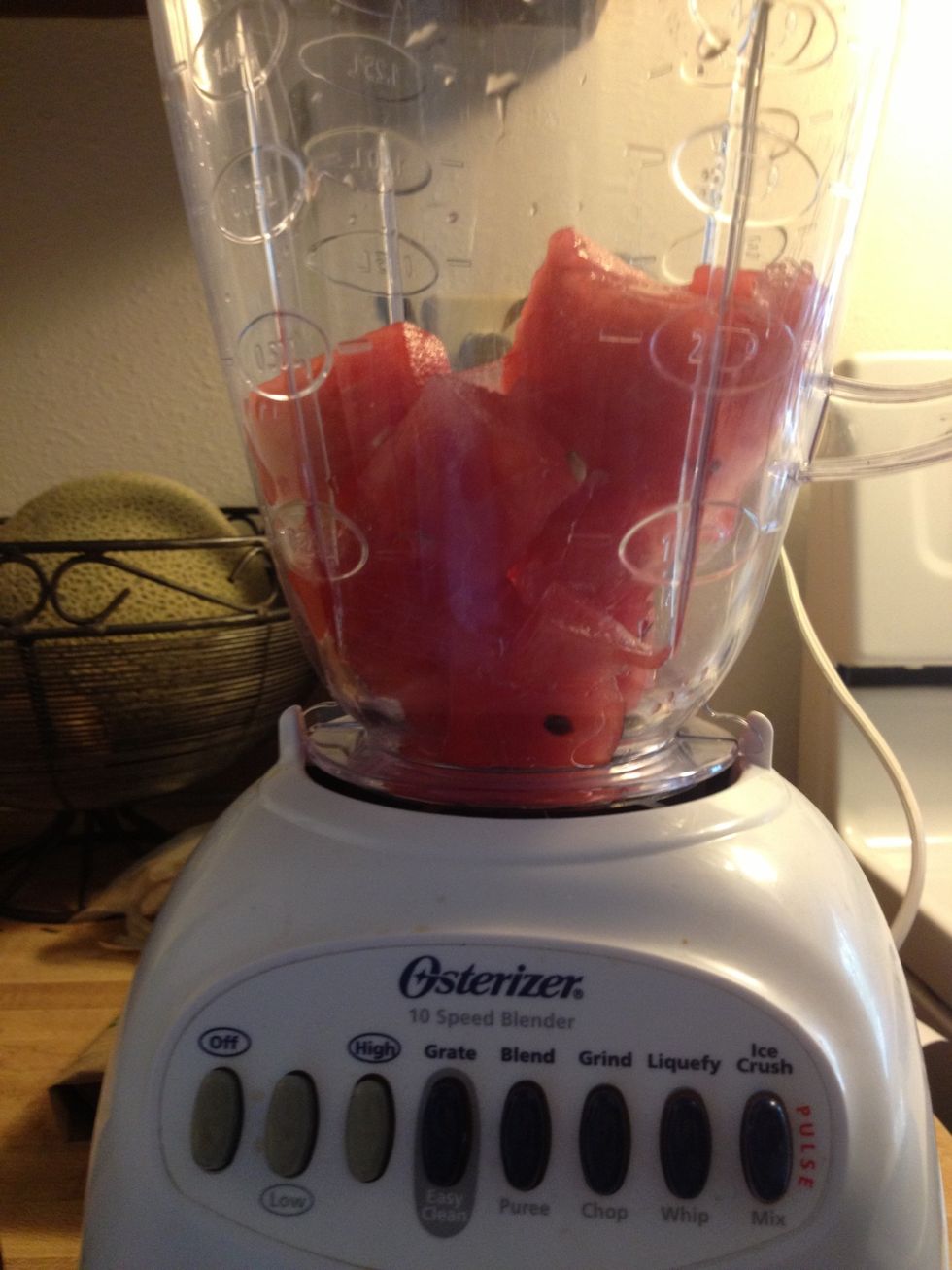 Add about 3 cups of frozen water melon