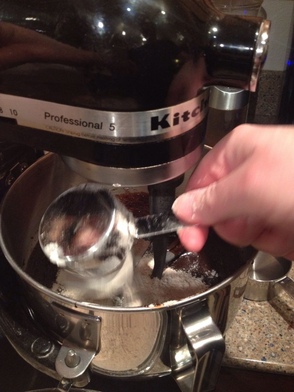 Add about a 1/3 of a cup of sifted flour at a time, with a little cold water also, and make sure the flour gets incorporated each time.