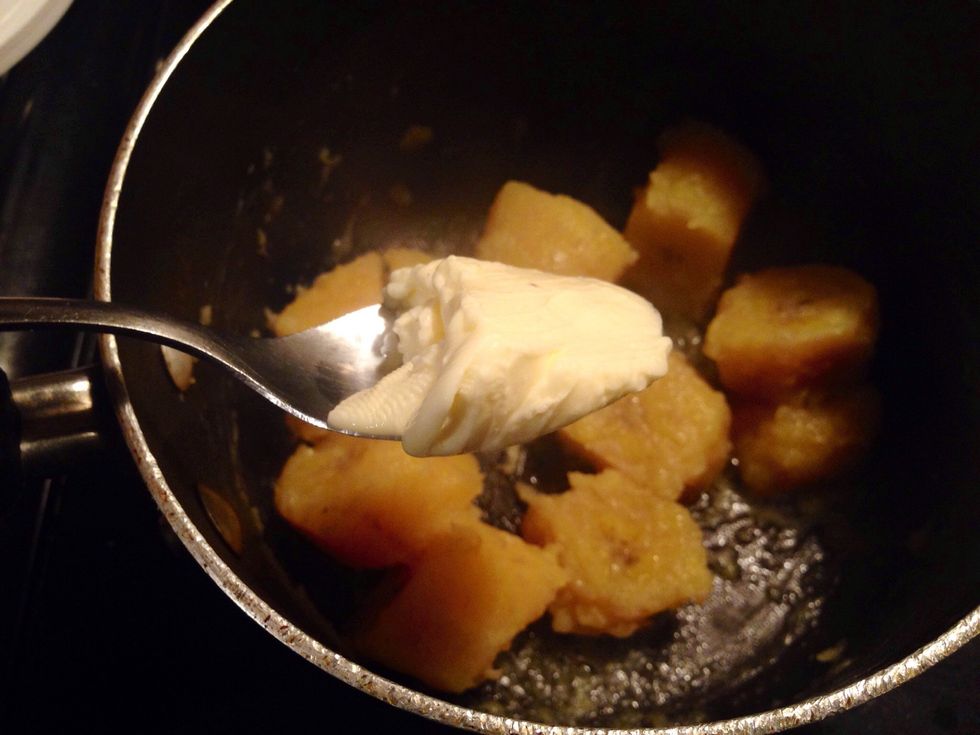 Add about a teaspoon of butter the water and stir. This will create a sizzle in your pot and help your plantains to crust up a bit.