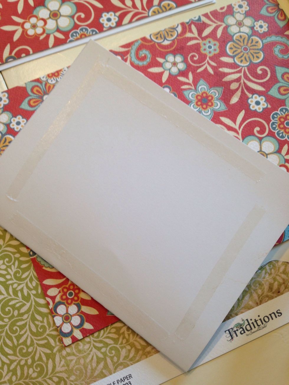 Add adhesive around all the sides of the top of your card.