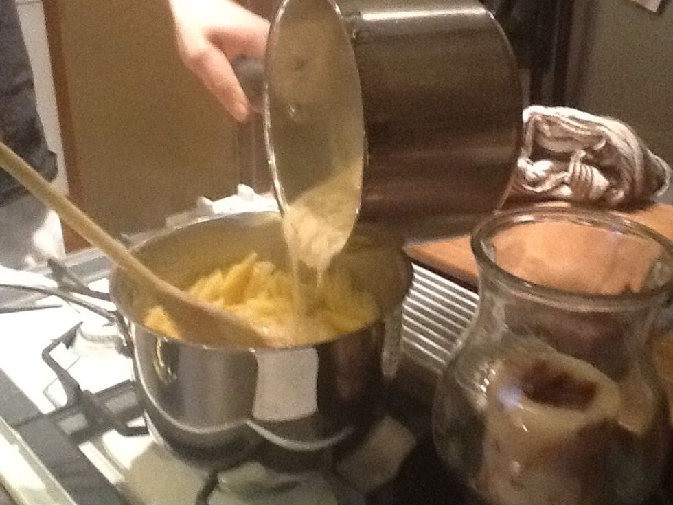 Add Alfredo/chicken to the pasta and stir around.