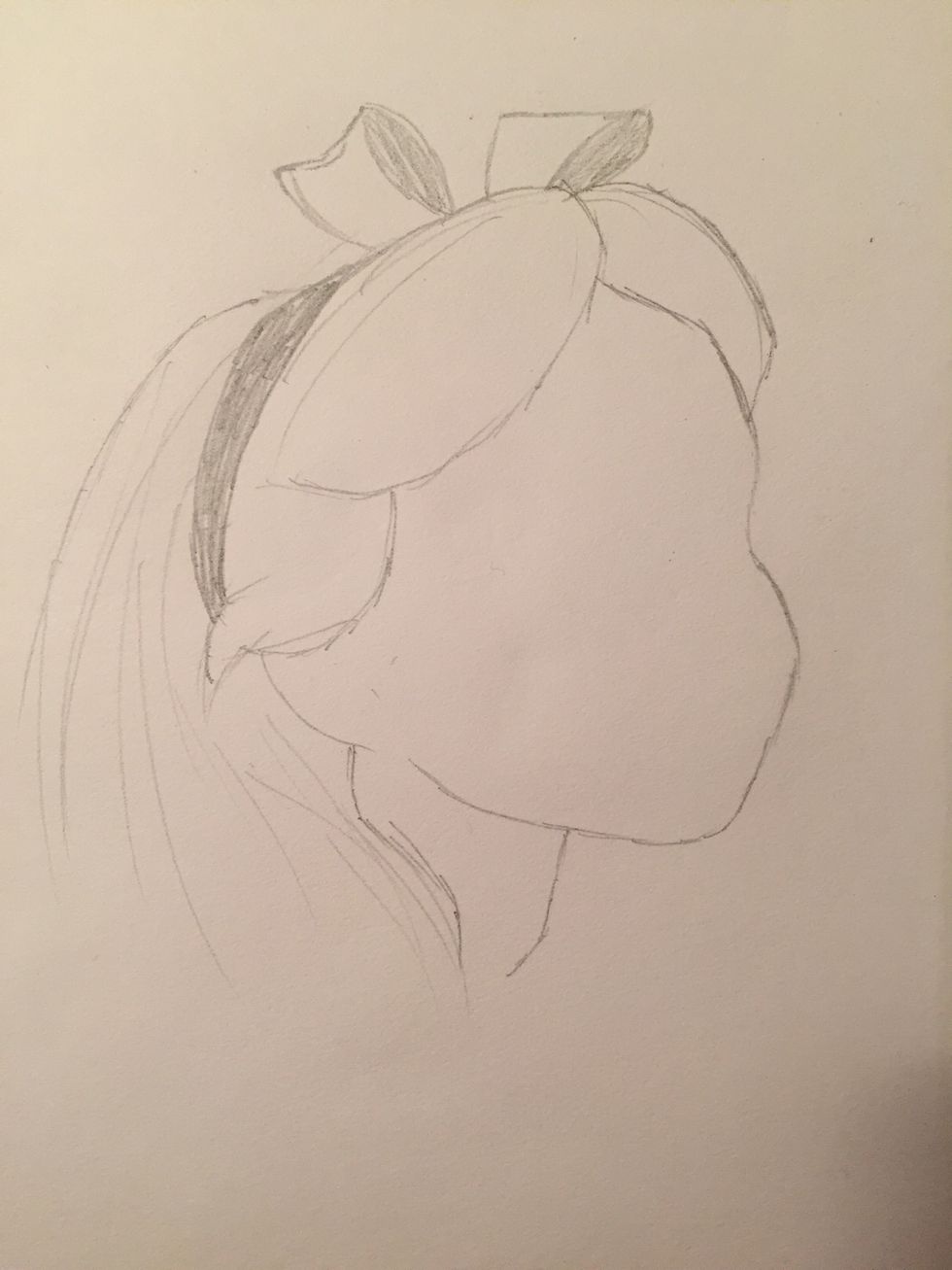 Add Alice's headband and shade it in so you can see it. Up on the top of her head, draw the two sides of her bow.