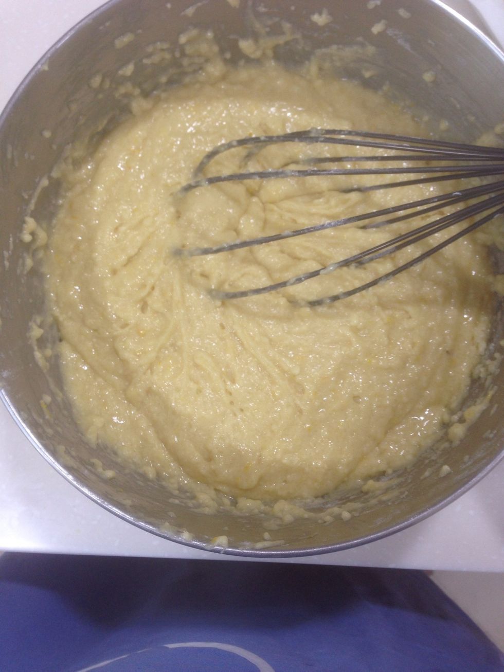 Add, all at once, wet ingredients into dry ingredients.