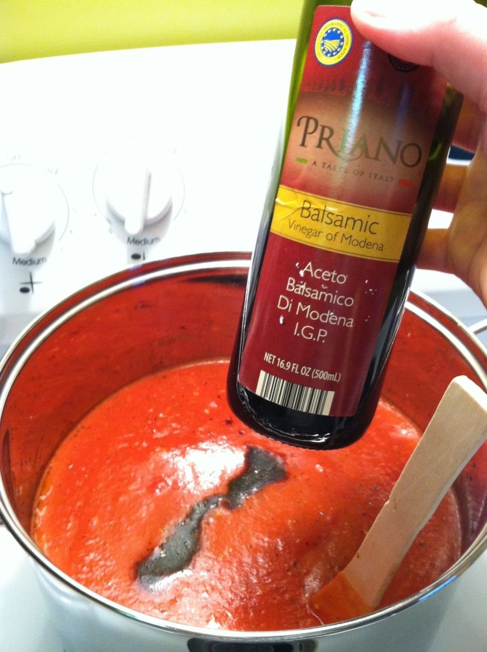 Add all canned tomatoes and my two secret ingredients: balsamic vinegar and sugar.