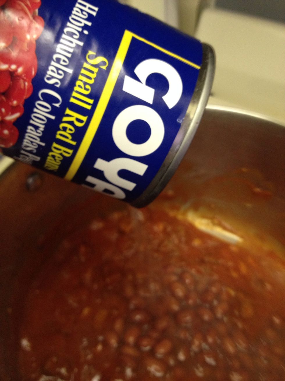 Add all cans of beans with liquid. (Some use dried beans. I use canned to cut the prep time)